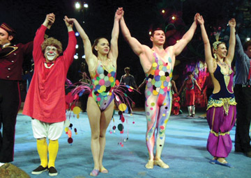 (From left to right) Grandma the Clown (Barry Lubin), aerialists Yana and Oleg Aniskin, and animal handler Michelle Youens take a bow. - Photos by Mimi Yeh
 