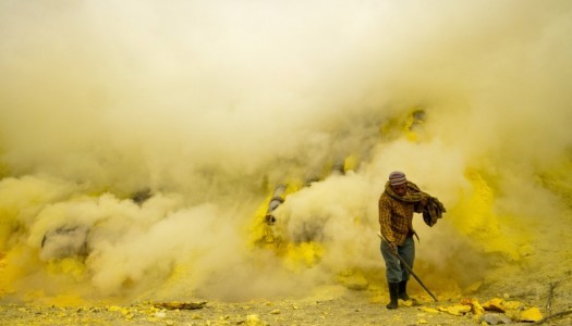 Hazardous gas surrounds this sulfur minor on the Kawah Ijen Volcano in the film Where Heaven Meets Hell
