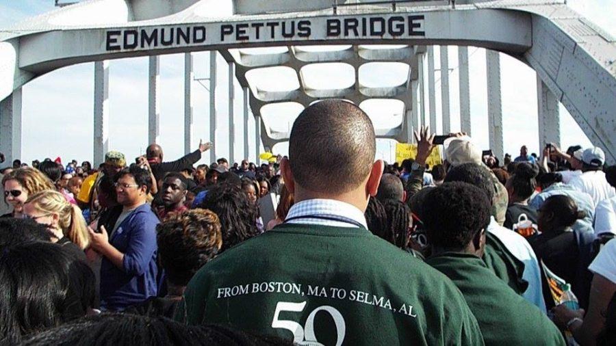 A+large+crowd+crosses+the+Edmund+Pettus+Bridge+in+honor+of+the+Bloody+Sunday+march+50+years+before.%26%23160%3B