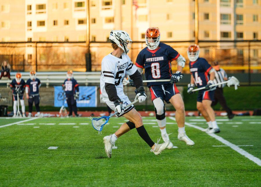 UMass+Boston+player+Darragh+Fahey+%28%2355%29+advances+in+the+game+against+Western+Connecticut+State+University+on+Wednesday%2C+April+20%2C+2022.