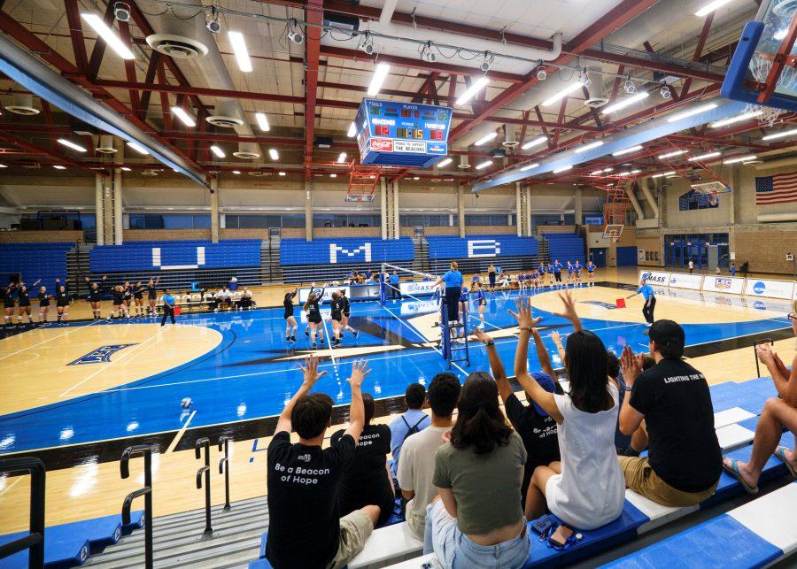 Spectators+cheer+at+a+volleyball+match+between+UMass+Boston+and+Maine+Maritime+Academy+in+the+Clark+Athletic+Center+on+Sep.+10%2C+2022.