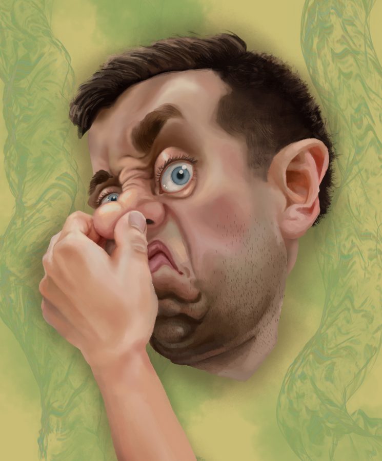 A man holds his nose.
