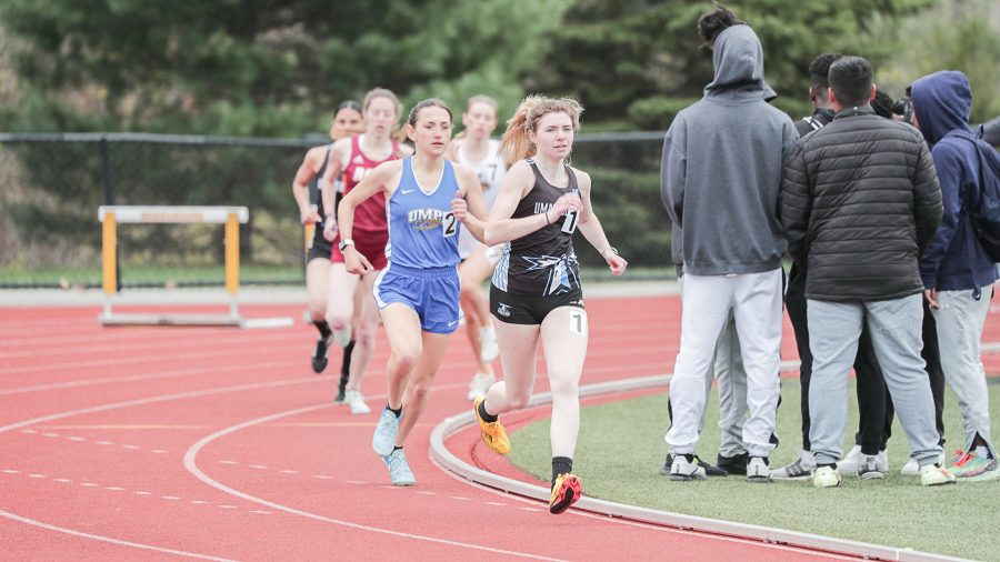 Women’s track and field race at Regis College. Photo by Ally Albano (She/Her) / Beacon Athletics.