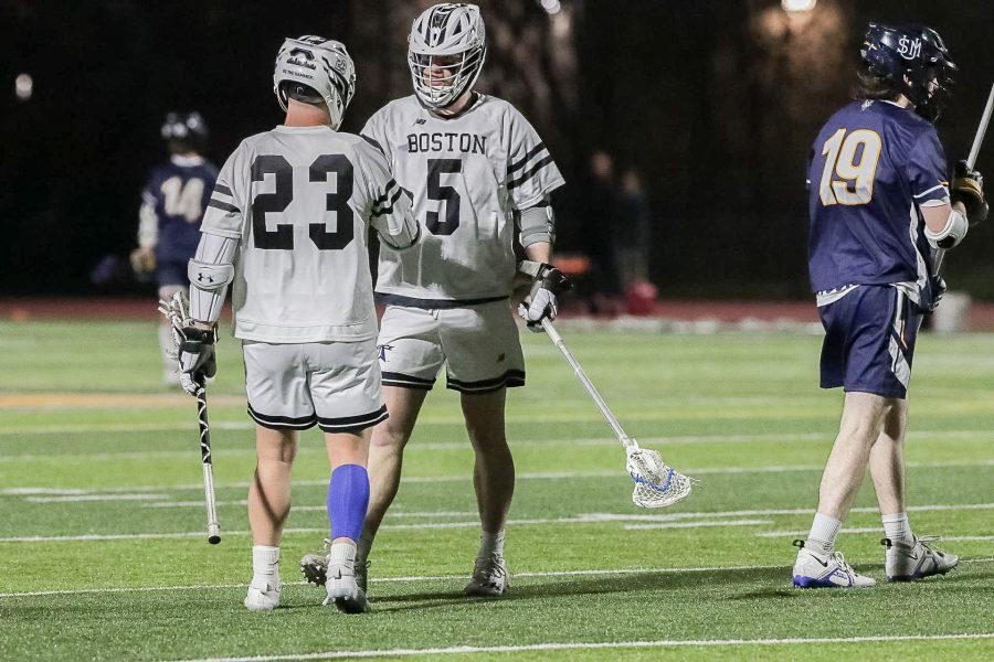 Players on the field at a recent men’s lacrosse home game. Photo courtesy of Beacon Athletics.