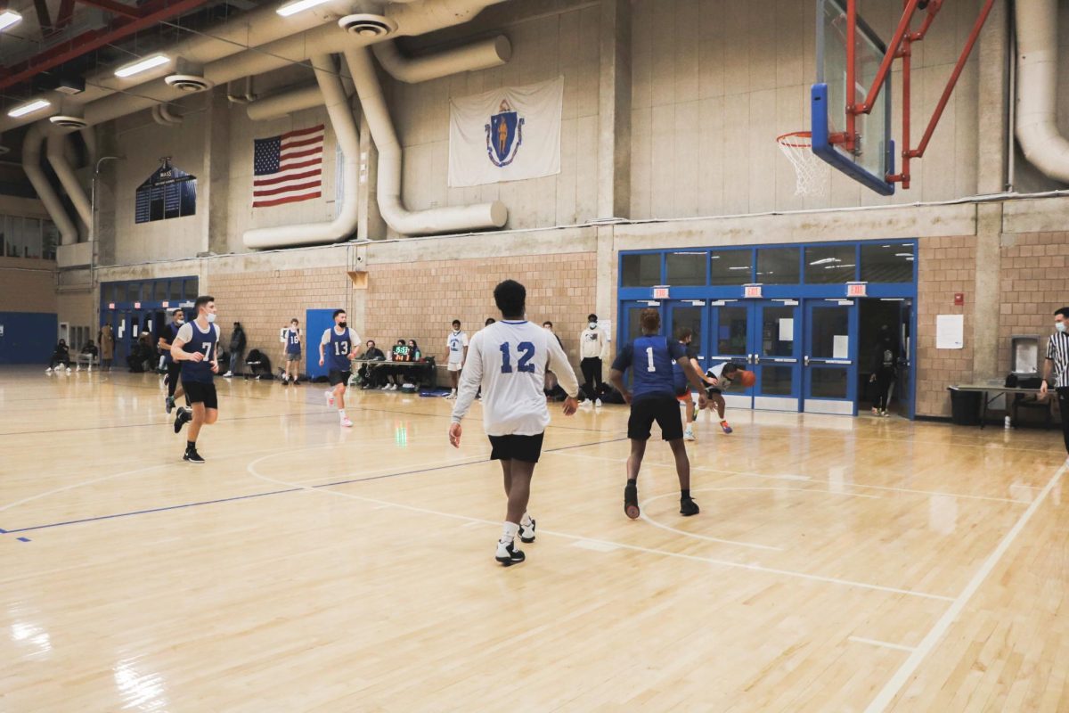 Students play basketball after classes in Clark Athletic Center. Photo by Olivia Reid / Photography Editor.