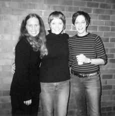 Rebecca Butler, Equal Connections Founder and Violence Prevention Consultant links arms with Women?s Center coordinator Ginn Norris and
 
