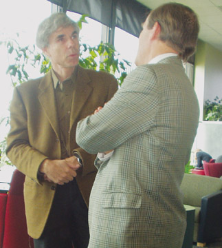 Douglas Hofstadter waxes philosophical on the finer points of poetry translation to a colleague in the Ryan Lounge. - Photo by MiMi Yeh
 