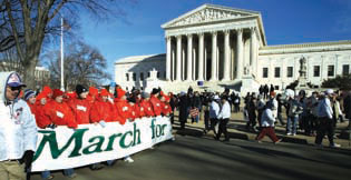 Abortion opponents march past the U.S. Supreme Court
 