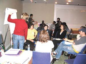 CPCS students in Professor Joan Arches´ Strategy and Proposal Development course facilitate small group discussion at their Engaging Student Voices forum last fall.
 