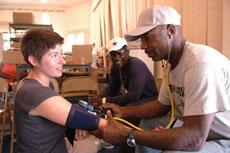 Volunteers give medical assistance in New Orleans
 