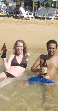 Bishoi and Megan enjoying the sun, waves, and drinks in Acapulo (Photo
 