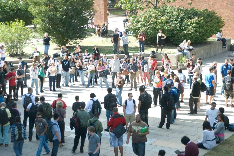 Students gathered around evangelist preacher Keith Darrell in
the plaza.
