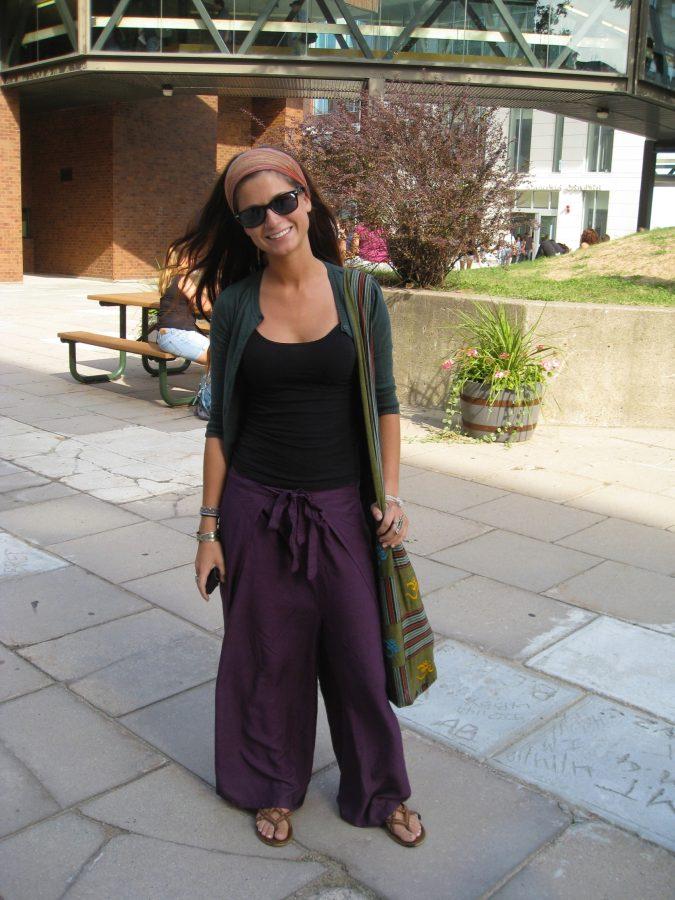 Colleen looks laid-back and cool with Tibetan pants, a headband
and sandals
