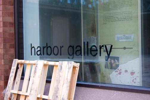 Close-up of the Harbor Art Gallery window, where exhibits are
typically booked a semester in advance.
