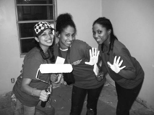 Nataly Bedoya, Glenny Casado (both UMB Alumni) and Joanne
Guillet help rebuild houses with Habitat for Humanity during
Alternative Spring Break 2009 in New Orleans.
