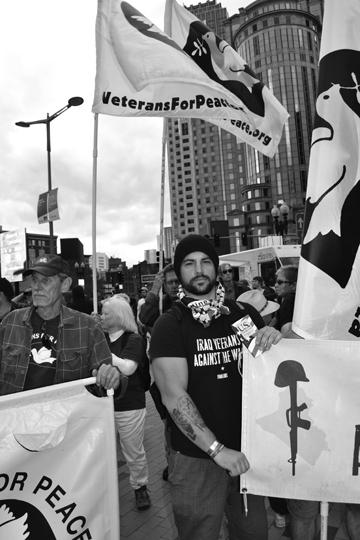 Jason Mizula and memebers of Veterans for Peace and Iraq
Veterans Against the War march during a global day of action on
Oct. 15.
