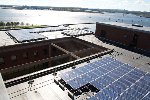 Solar panels on the roof of Wheatley are part of a statewide
project partially funded by a stimulus from the American Recovery
and Reinvestment Act (ARRA) of 2009.
