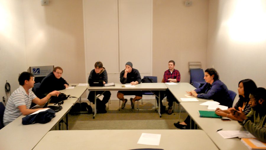 The Steering Committee, made up of the highest campus elected officials, meet with Student Life Director Shelby Harris.