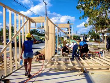Brianna Reyes (left), sophomore and trip leader, walks away from her worksite during lunch. Eleven students from UMB travelled to West Palm Beach, Florida to work with Habitat for Humanity.