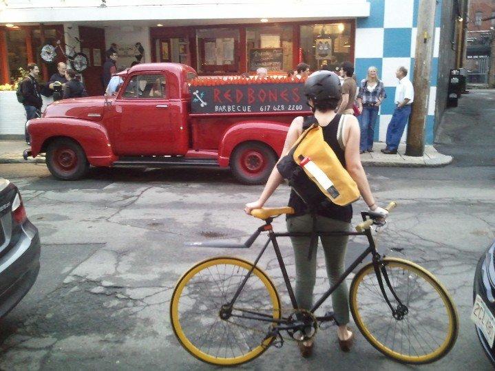 The author, Hannah Risser-Sperry, on her "bumble bee" bike