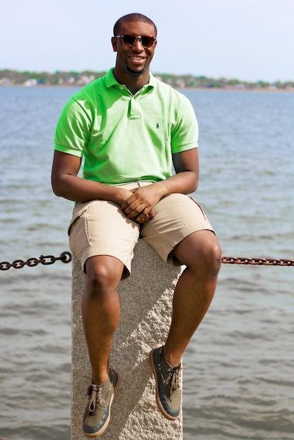 The+author+wears+a+loud+green+polo+shirt+and+classic+summer+boat+shoes