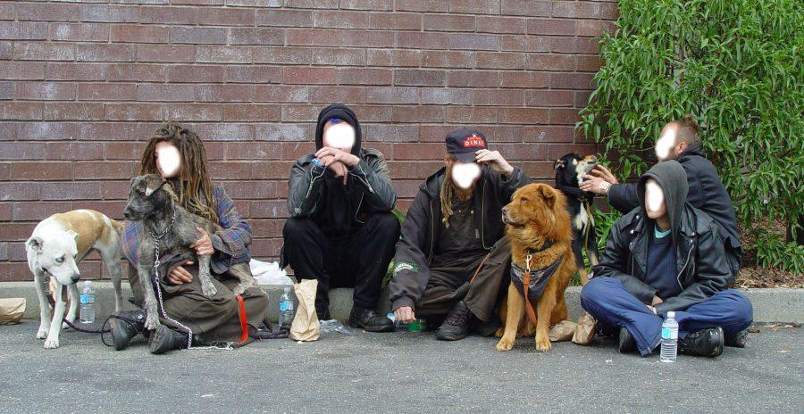 A+group+of+homeless+sit+with+their+dogs+at+Haight+Street+in+San+Francisco%2C+circa+2006.+A+report+compiled+by+the+city+and+the+Applied+Survey+Research+at+the+beginning+of+2015+indicated+San+Franciscos+homeless+numbered+6%2C668.