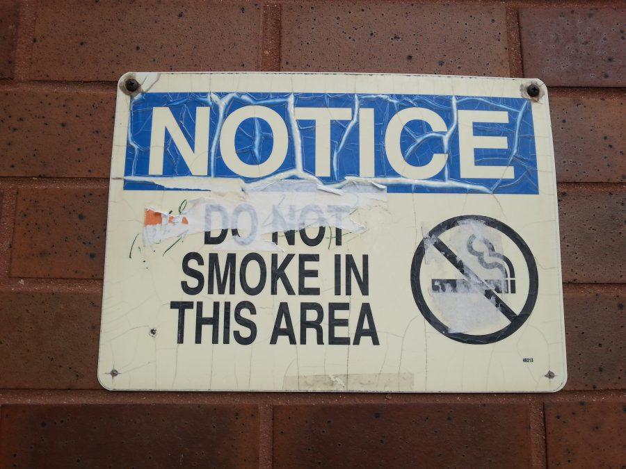 The in-your-face signs about UMass Boston's smoking policy have largely vanished. They are now infrequent, old, and out of the way.