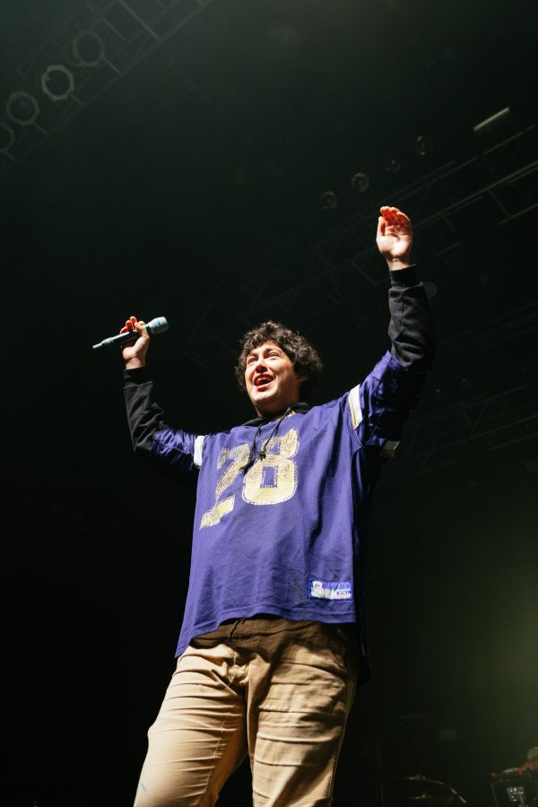 Hobo Johnson tosses his hands up in excitement while performing at HOB Boston. 