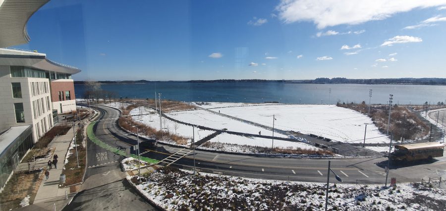 Snow covers the campus of UMass Boston. 