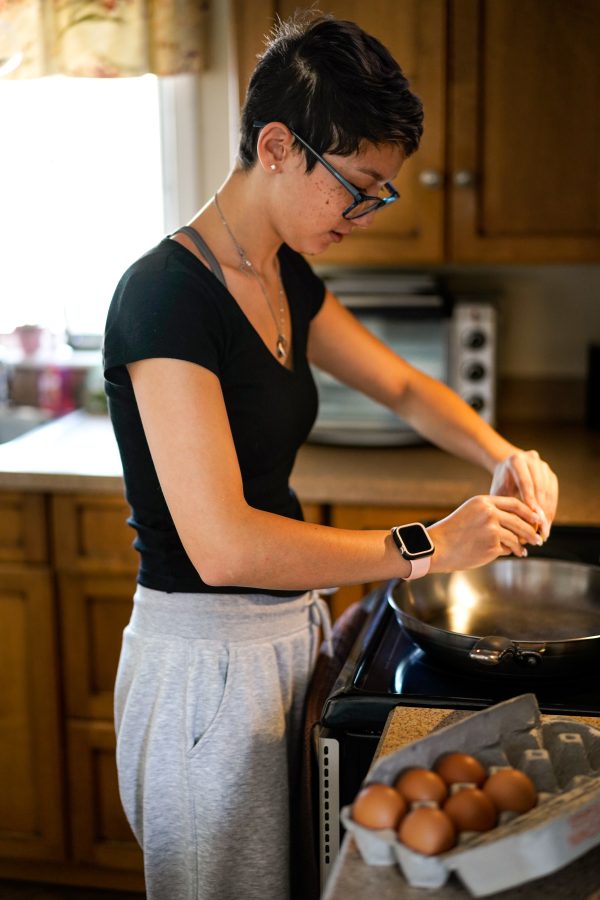 Image of UMass Boston Student Cooking.
