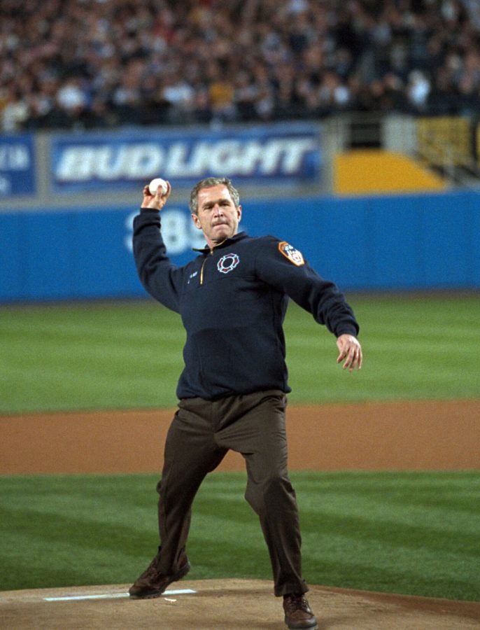 President George W. Bush throws out the ceremonial first pitch Tuesday, Oct. 30, 2001, at Yankee Stadium before Game Three of the World Series between the Arizona Diamondbacks and the New York Yankees. Photo by Eric Draper, Courtesy of the George W. Bush Presidential Library.