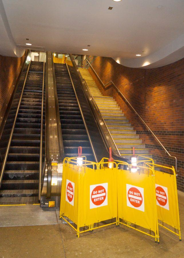Closed off escalator connecting to commuter rail at Back Bay station after injuries occurred due to a malfunction.