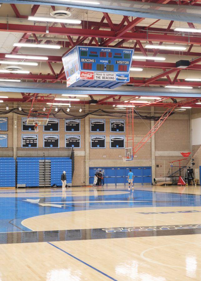 UMass Boston students participate in open recreation at the basketball courts within the Clark Athletic Center.