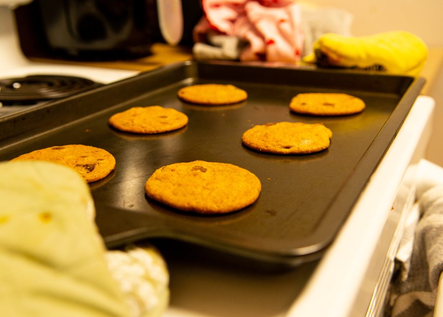 Freshly made cookies are set out to cool.