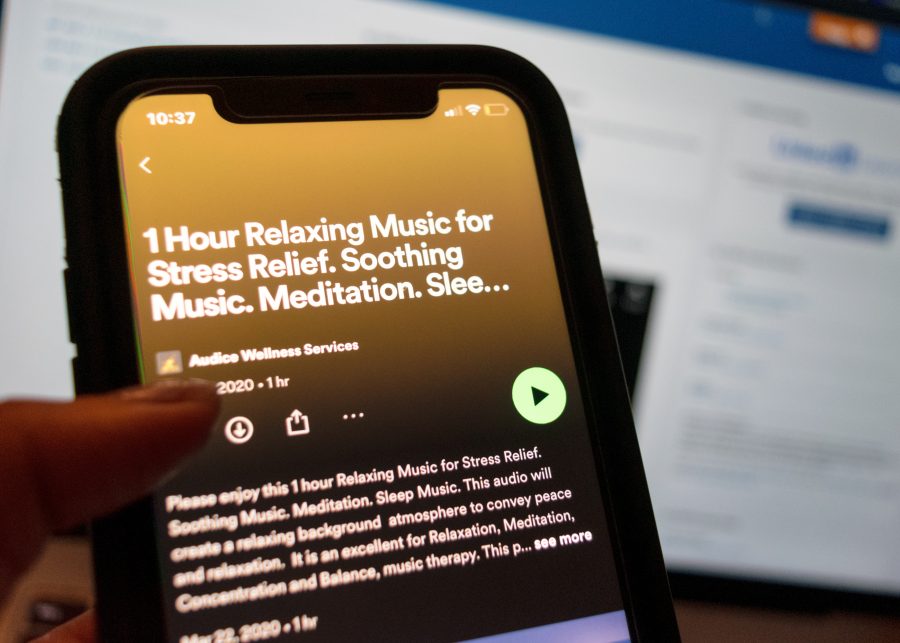 A UMass Boston student plays a relaxation playlist on Spotify to let go of some stress.