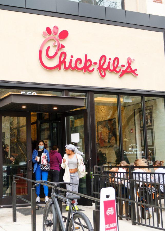 Customers leave the packed Chick-Fil-A on Boylston Street.