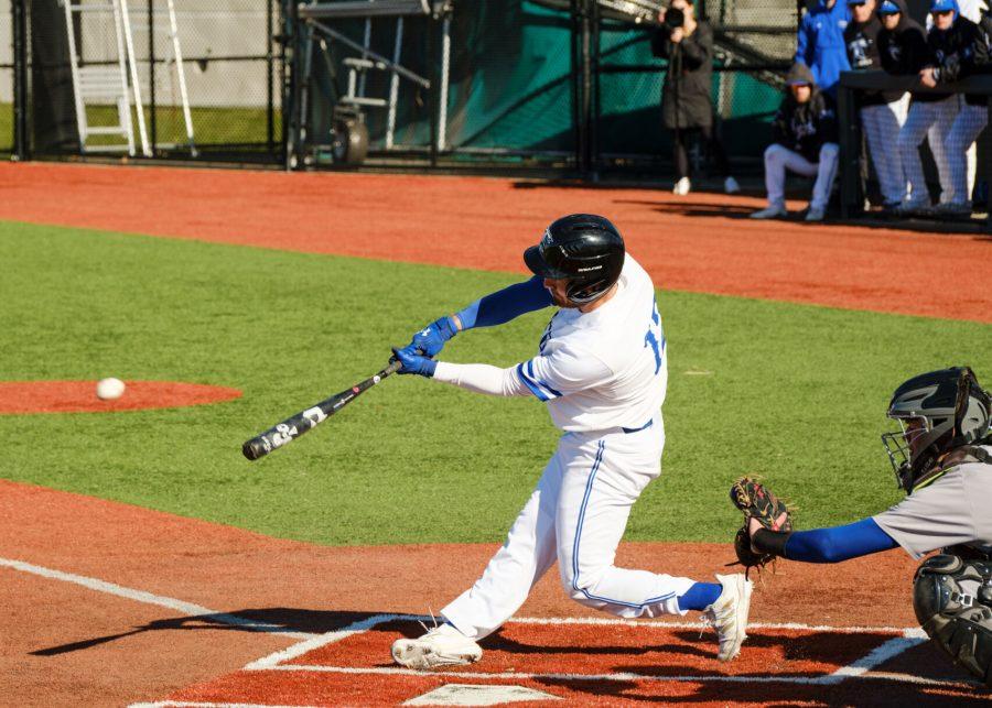 A UMass Boston baseball player batting in a game earlier this season.