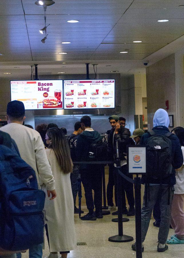 Students wait in line at Burger King after class in the Campus Center food court.