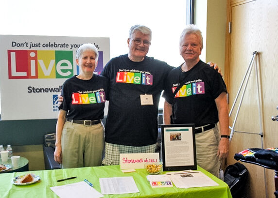 Members of OLLI hold a tabling event.