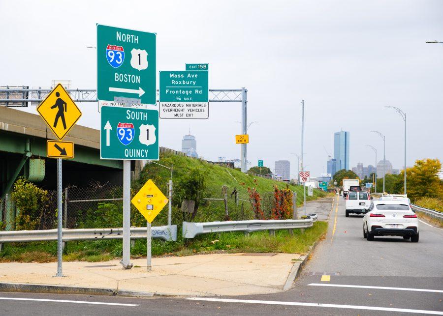 Signs point travelers towards the North and South directions of the Interstate 93 highway in Dorchester.