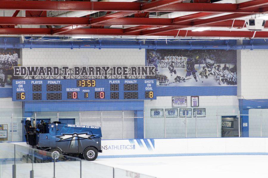 UMass Boston staff resurface the ice for an upcoming game.