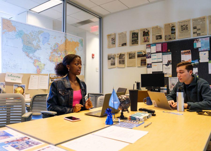 UMass Boston study abroad ambassadors Ryan and Malaika host a walk-in advising session in the Global Programs office in Campus Center.