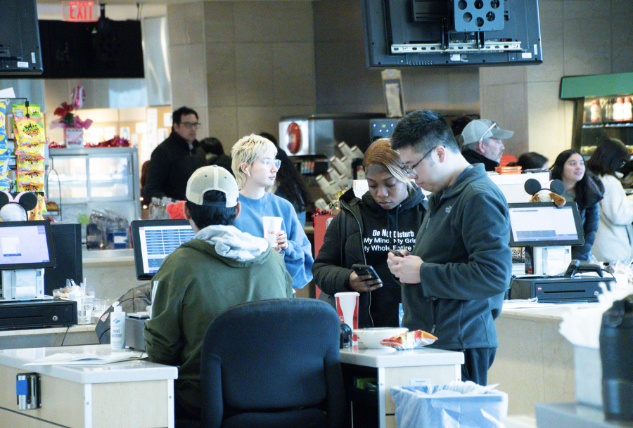 Students in line at the Campus Center Food Court. Photo by Caitlin Feest (She/Her) / Mass Media Contributor.  
