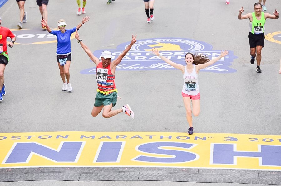 Boston Marathon participants cross the finish line. Photo courtesy of Corwin Wickersham. 