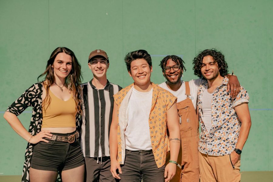 The Q-Tip Bandits, one of the performers of Day Two of Boston Calling on Friday, May 27, pose for a photo after their set. The band, from left to right, are as follows: Claire Davis, Dakota Maykrantz, Leo Son, Hoyt Parquet and Maclin Tucker. Photo by Olivia Reid (She/Her) / Photography Editor.