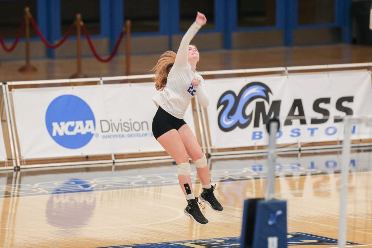 Sophomore Amelia Devlin takes a kill shot during a home game on Sept. 2. Photo by Beacon Athletics.