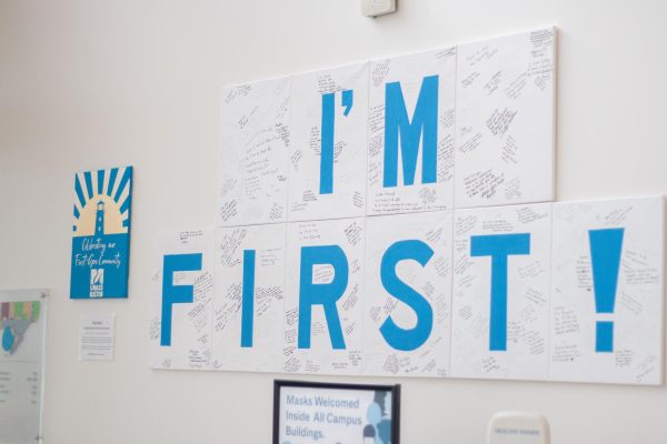 A sign for First-Gen Week located in University Hall. Photo by Colin Tsuboi / Mass Media Staff.