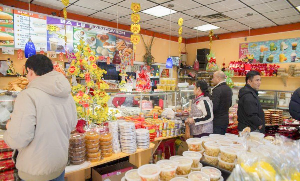 Patrons shop at Banh Mi Ba Le, a Vietnamese bakery located in Dorchester. Photo from the Mass Media Archives.