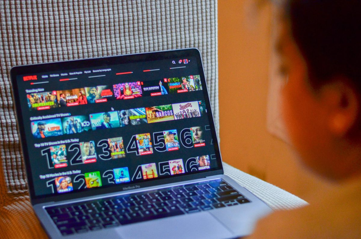 A student browses through Netflix. Photo by Saichand Chowdary / Mass Media Staff.