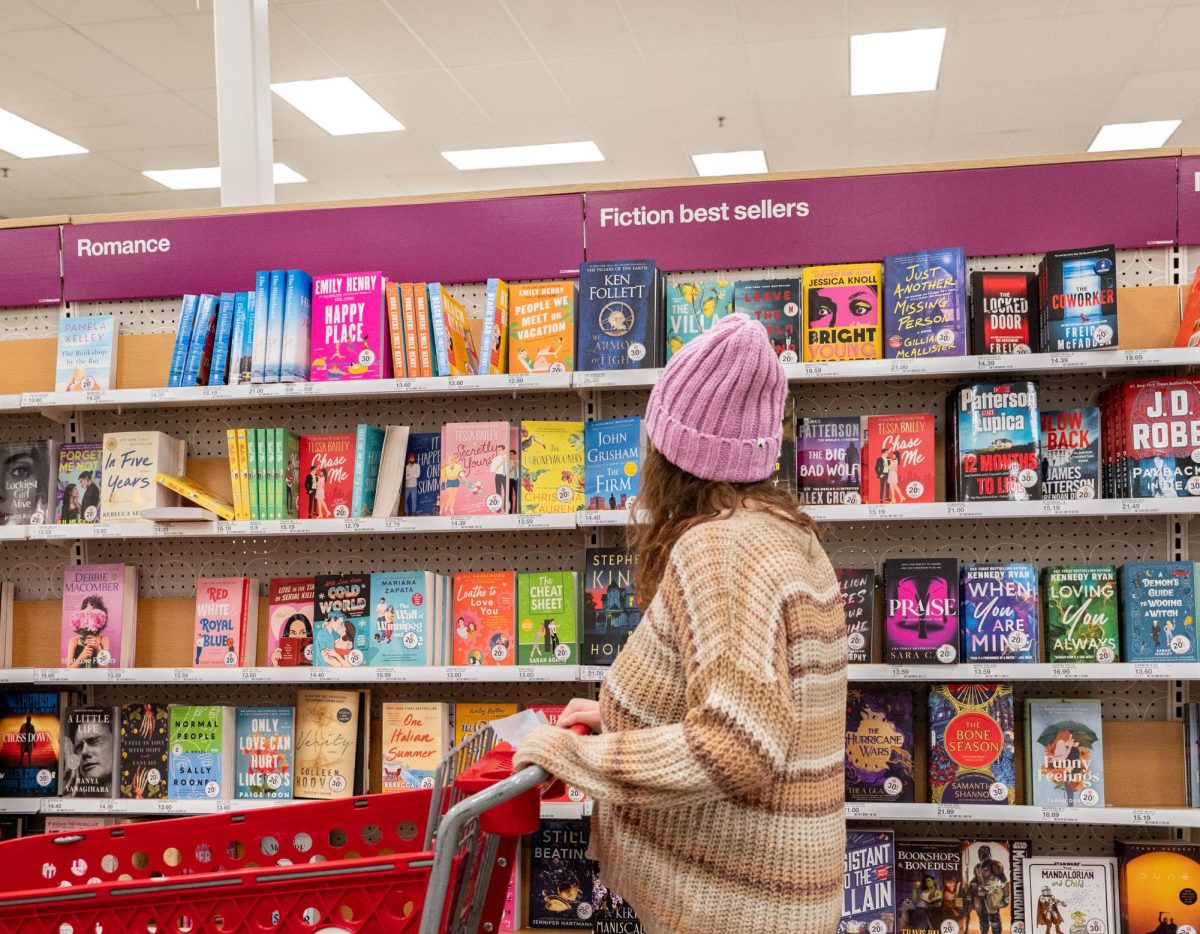 A student shops for a new book to read. Photo by Olivia Reid / Photography Editor.